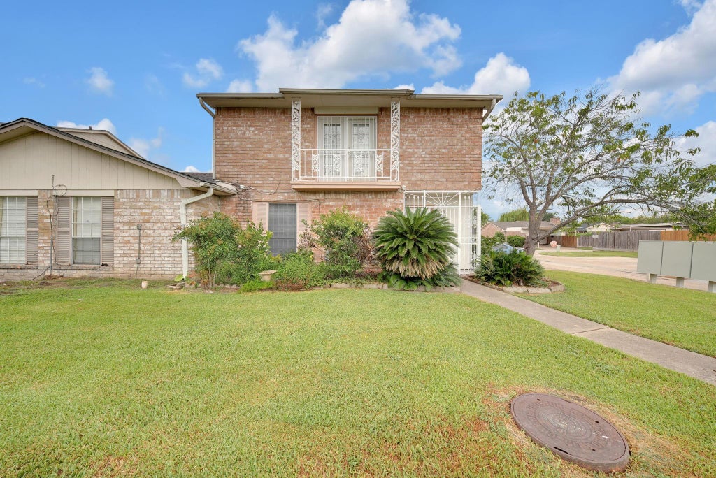 Photo of 6379 S Briar Bayou Drive, Houston, TX 77072 (MLS # 45411387)