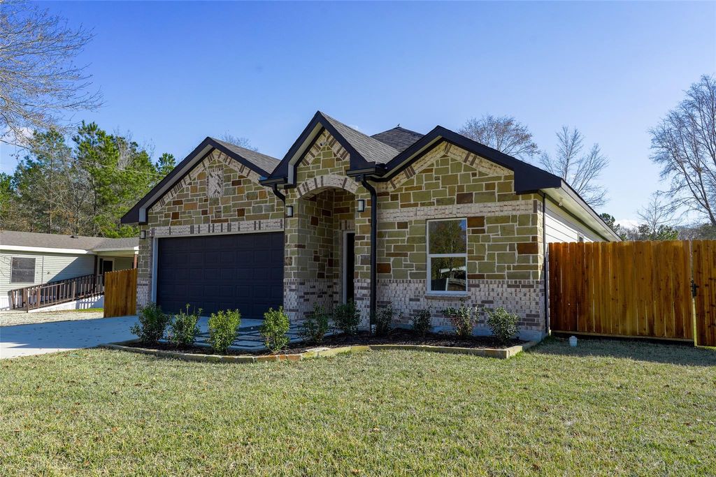 Photo of 408 County Rd 3414, Cleveland, TX 77327 (MLS # 69887678)