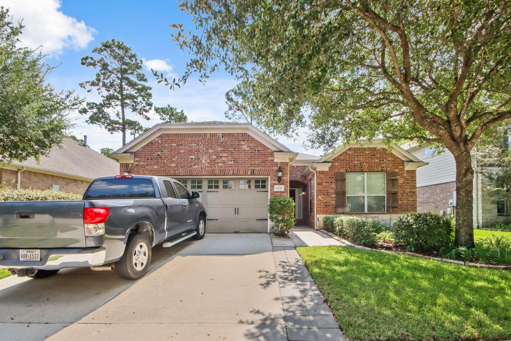 Photo of 16918 Cherokee Lake Lane, Houston, TX 77044 (MLS # 68587173)