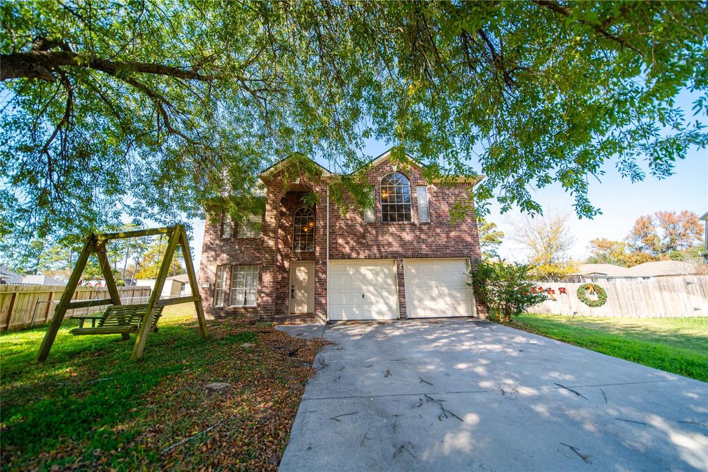 Photo of 10723 Scenic Drive, Montgomery, TX 77356 (MLS # 7210666)