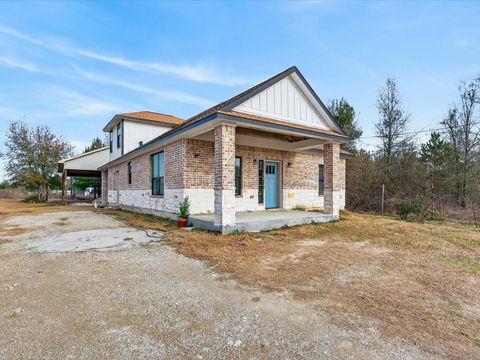 Photo of 1833 County Road 3556, Cleveland, TX 77327 (MLS # 11931260)
