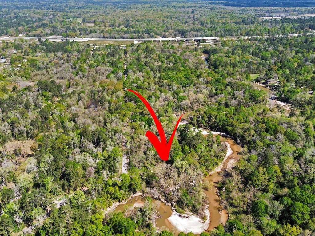 Photo of TBD Riverside Drive, New Caney, TX 77357 (MLS # 66777872)