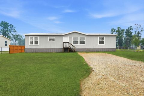 Photo of 12245 County Road 37495, Cleveland, TX 77327 (MLS # 43845593)