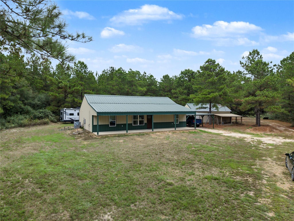 Photo of 56 Lost Indian Camp Road, Huntsville, TX 77320 (MLS # 52739796)