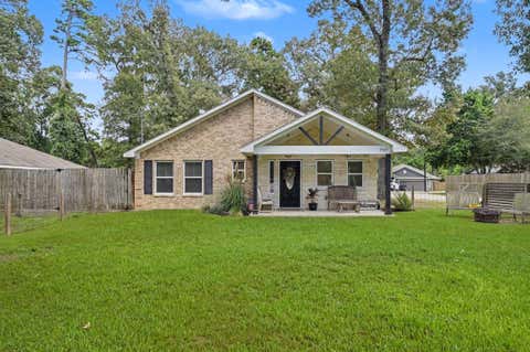 Photo of 9589 Thousand Oaks Loop, Montgomery, TX 77316 (MLS # 23145011)