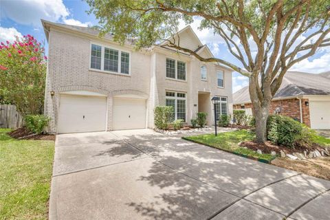 Photo of 12414 N Shadow Cove Drive Lane, Houston, TX 77082 (MLS # 16836306)
