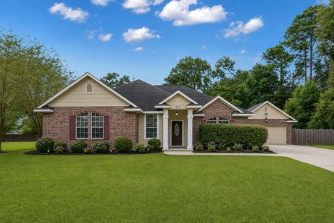 Photo of 409 Mildred Street, Cleveland, TX 77328 (MLS # 24942470)