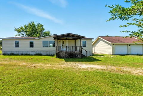 Photo of 128 Hill Top Lane, Huntsville, TX 77320 (MLS # 18495652)