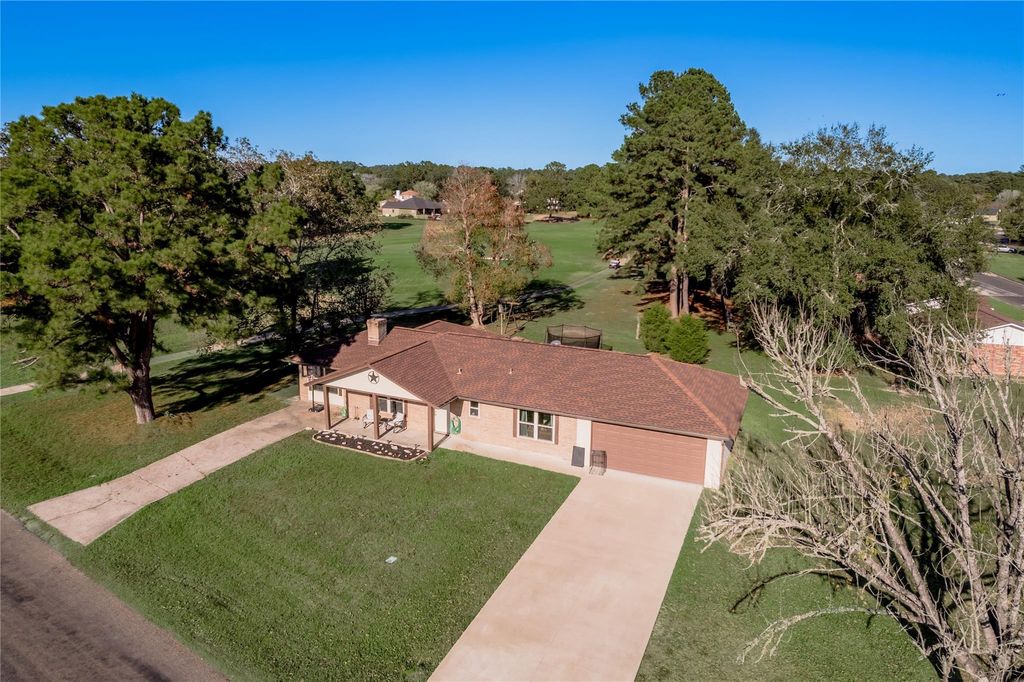 Photo of 64 Coral Gables, Trinity, TX 75862 (MLS # 25457103)