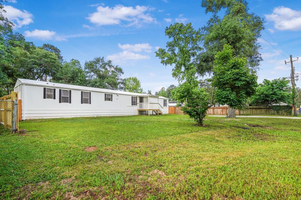 Photo of 21950 Caney Drive, New Caney, TX 77357 (MLS # 24873300)
