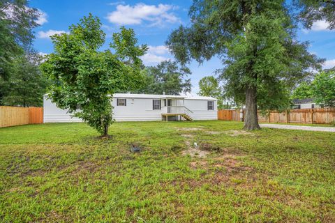 Photo of 21950 Caney Drive, New Caney, TX 77357 (MLS # 24873300)