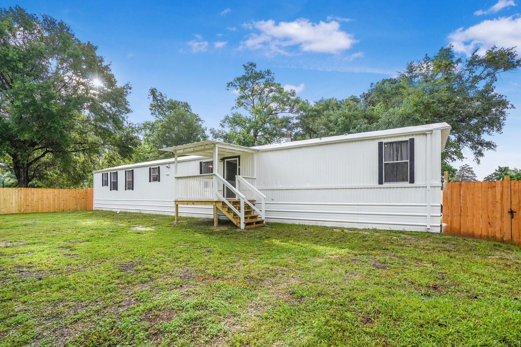 Photo of 21950 Caney Drive, New Caney, TX 77357 (MLS # 24873300)
