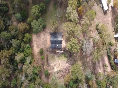 Photo of 10699 Magnolia Drive, Conroe, TX 77303 (MLS # 74260308)