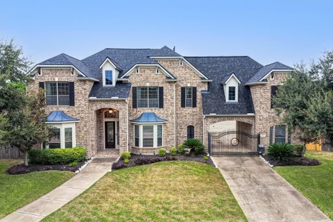 Photo of 7606 Courtney Manor Lane, Katy, TX 77494 (MLS # 42372321)