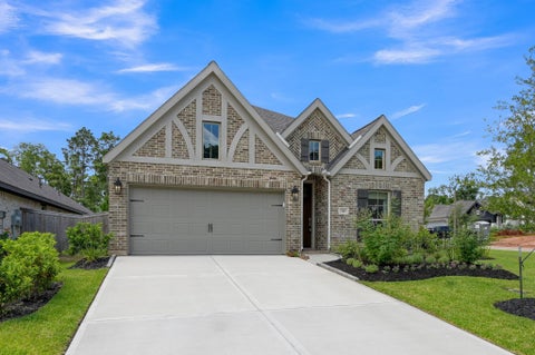 Photo of 348 Rockrose Path, Willis, TX 77318 (MLS # 22143056)