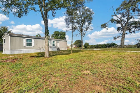 Photo of 9998 County Road 413, Navasota, TX 77868 (MLS # 54913888)