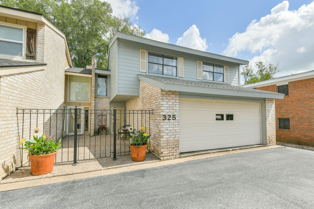 Photo of 325 E Main St Street, Brenham, TX 77833 (MLS # 56638149)