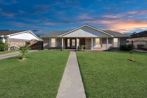 Photo of 9222 Sharpview Drive, Houston, TX 77036 (MLS # 86543100)