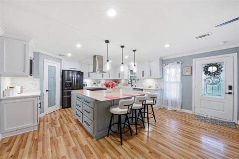 Photo of 321 Reid Street, Houston, TX 77022 (MLS # 81391597)