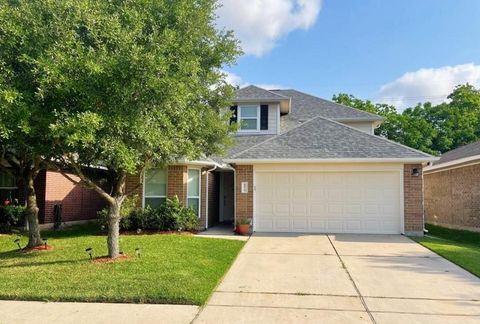 Photo of 8815 Lyndonnille Falls Lane, Houston, TX 77078 (MLS # 48636504)