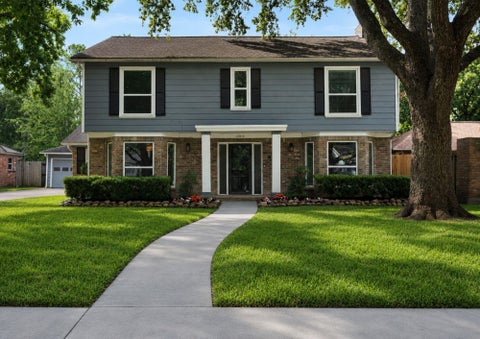 Photo of 12019 Sugar Springs Drive, Houston, TX 77077 (MLS # 34933546)
