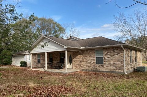 Photo of 14755 Quinette Rd Rd, Conroe, TX 77302 (MLS # 32431917)