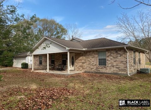 Photo of 14755 Quinette Rd Rd, Conroe, TX 77302 (MLS # 32431917)