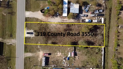 Photo of 319 County Road 3550, Cleveland, TX 77327 (MLS # 61971979)