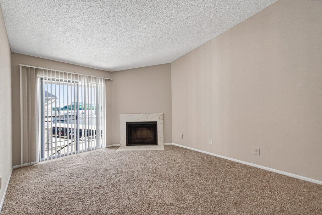 Photo of 12550 Whittington Drive #610, Houston, TX 77077 (MLS # 9303149)