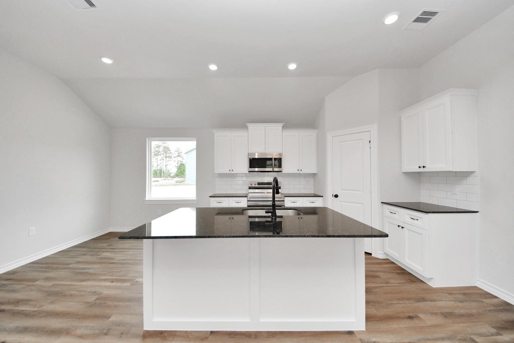 Photo of 12825 Naval Drive, Conroe, TX 77306 (MLS # 93401836)