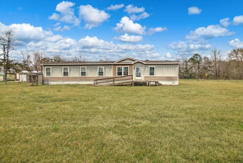 Photo of 615 County Road 2251, Cleveland, TX 77327 (MLS # 36588141)