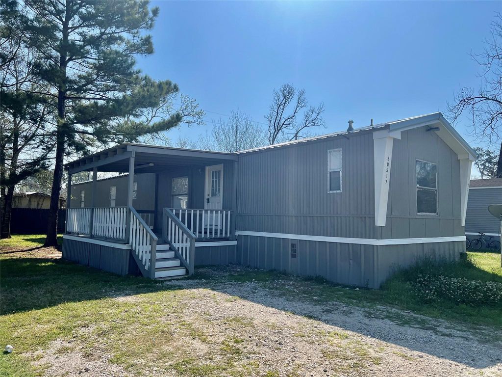 Photo of 20517 N Navasota Drive, New Caney, TX 77357 (MLS # 28481594)