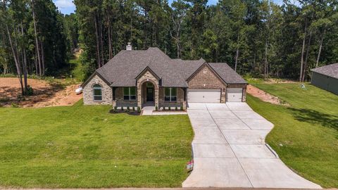 Photo of 11775 Oakwood Ranch Dr, Willis, TX 77378 (MLS # 22427117)