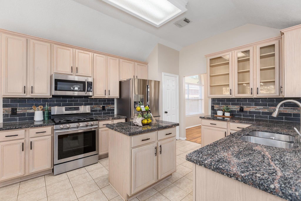 Photo of 8015 Sports Haven Drive, Humble, TX 77346 (MLS # 67928844)