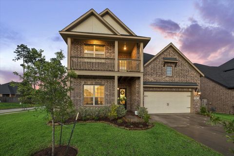 Photo of 1365 Knollbridge Point Lane, Pinehurst, TX 77362 (MLS # 30878525)