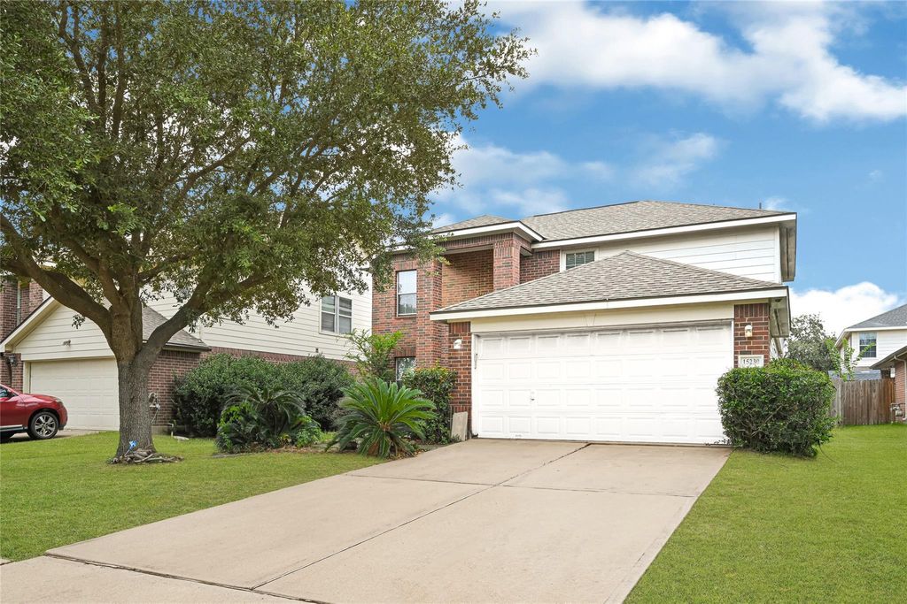 Photo of 15230 Weeping Cedar Lane, Houston, TX 77084 (MLS # 31526902)