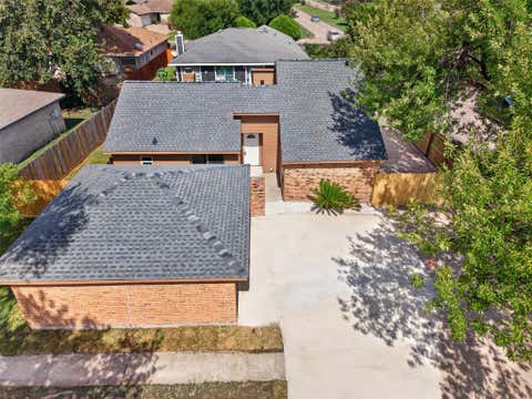 Photo of 8702 Parkway Forest Drive, Houston, TX 77044 (MLS # 6301341)