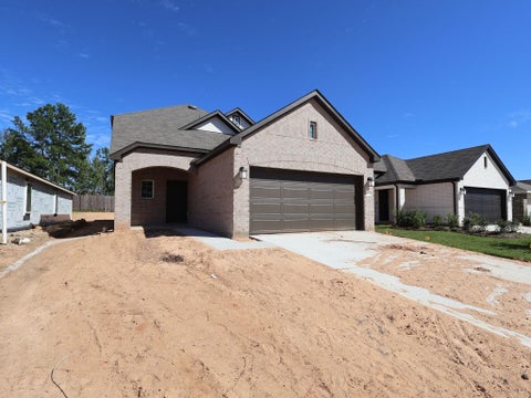 Photo of 609 Falling Cave Drive, Willis, TX 77378 (MLS # 56676871)