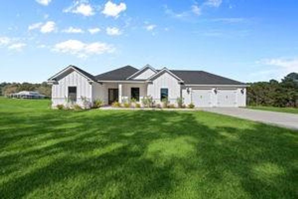 Photo of 11695 Amberwood Drive, Montgomery, TX 77356 (MLS # 75891301)