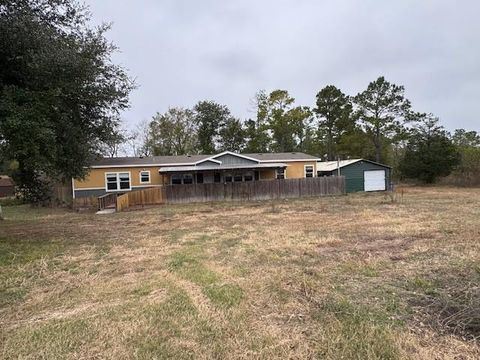 Photo of 71 Trail Ridge Road, Huntsville, TX 77320 (MLS # 78524454)