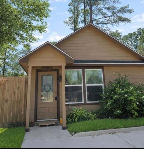 Photo of 9593 Darkwood, Willis, TX 77318 (MLS # 48248222)