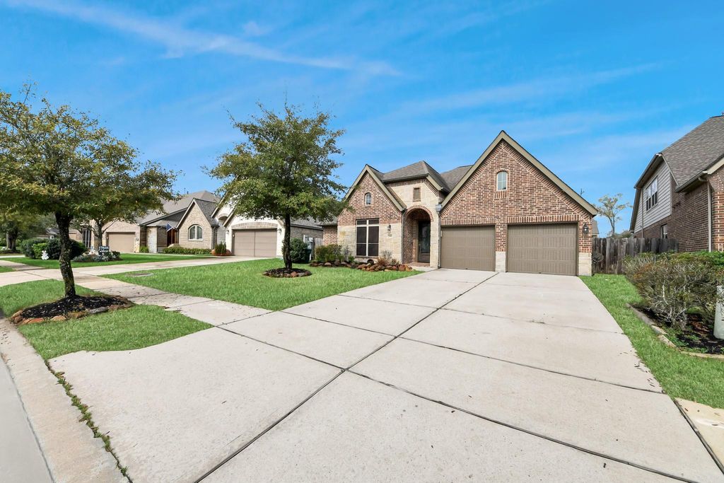 Photo of 23411 Reynolds Pond Drive, New Caney, TX 77357 (MLS # 95746970)