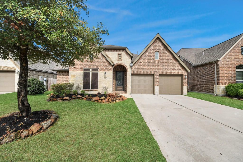 Photo of 23411 Reynolds Pond Drive, New Caney, TX 77357 (MLS # 95746970)