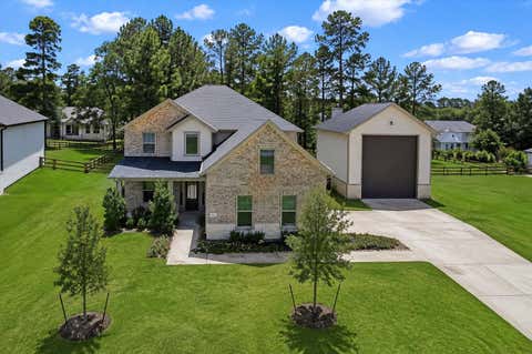 Photo of 615 Running Iron Lane, Magnolia, TX 77354 (MLS # 93199321)