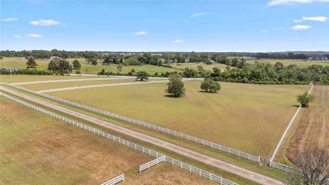 Photo of 1702 Spring Branch Road, Montgomery, TX 77316 (MLS # 30212555)