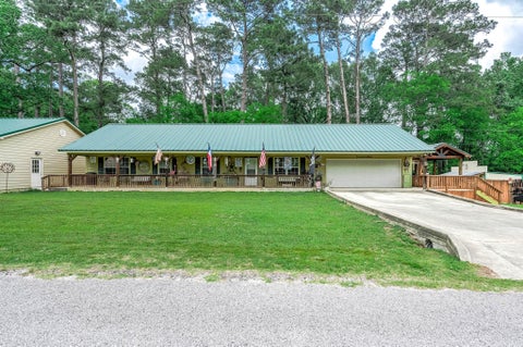 Photo of 100 Magnolia Place, Coldspring, TX 77331 (MLS # 42849385)