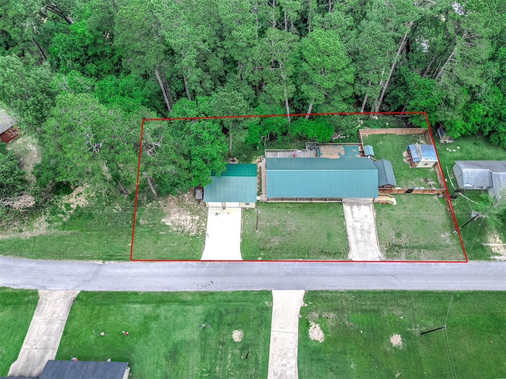 Photo of 100 Magnolia Place, Coldspring, TX 77331 (MLS # 42849385)
