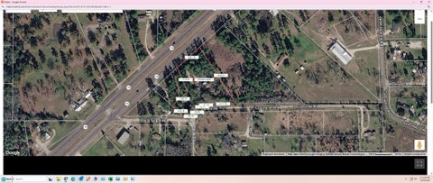 Photo of 3046 State Highway 19, Huntsville, TX 77320 (MLS # 96832261)