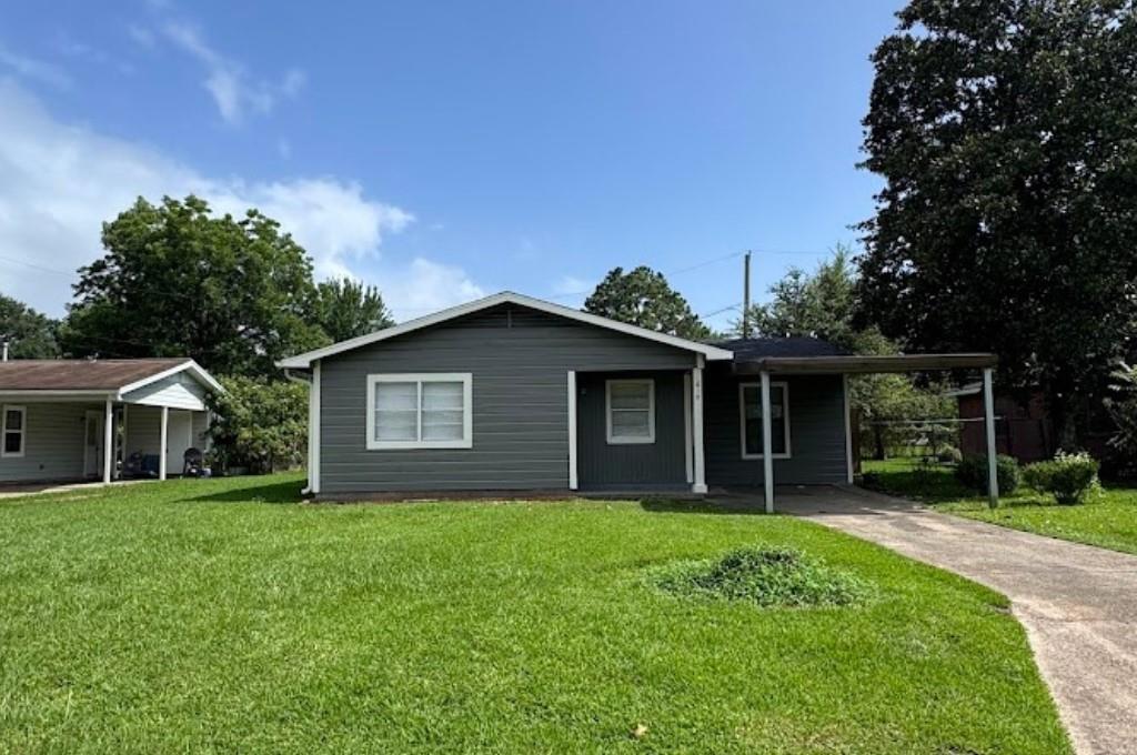 Photo of 1819 Lincoln Drive, Orange, TX 77630 (MLS # 63649032)