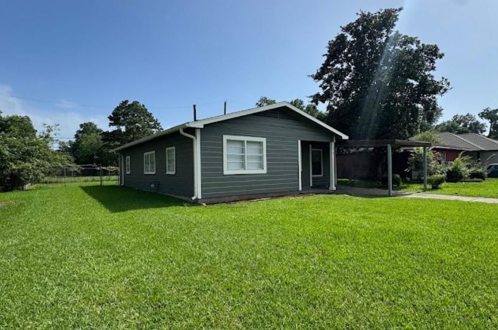 Photo of 1819 Lincoln Drive, Orange, TX 77630 (MLS # 63649032)